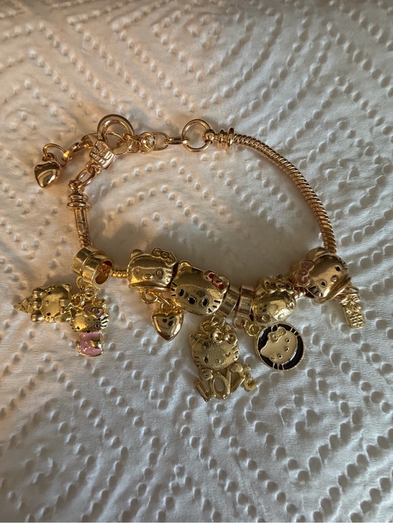 Sanrio Jewelry - Sanrio Hello Kitty Gold and Pink Charm Bracelet